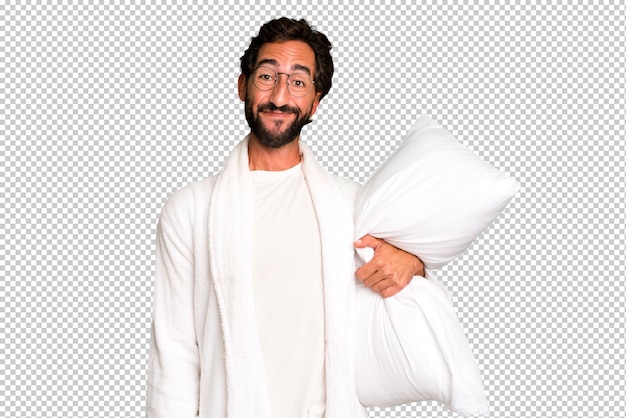 Young crazy bearded and expressive man wearing bathrobe and a pillow