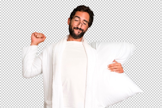 PSD young crazy bearded and expressive man wearing bathrobe and a pillow