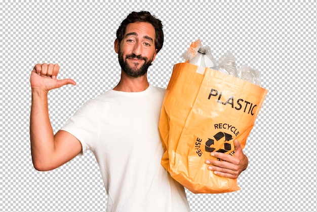 Young crazy bearded and expressive man with a bag to recycle