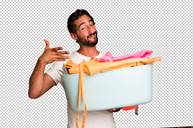 PSD young crazy bearded and expressive man with clothes to wash housekeeper concept