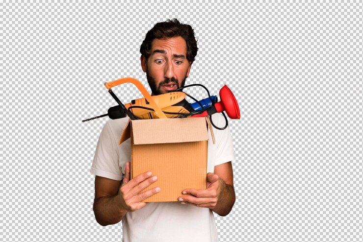 PSD young crazy bearded and expressive man with a toolbox handyman concept