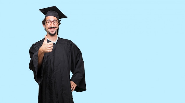 young graduated man looking stressed and frustrated