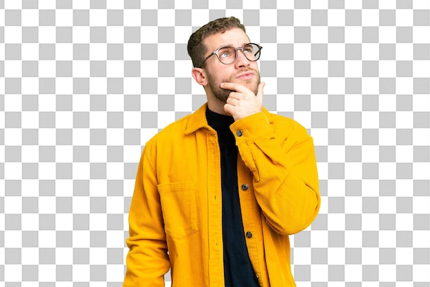 Young handsome blonde man over isolated chroma key background having doubts