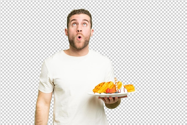 young handsome blonde man over isolated chroma key background