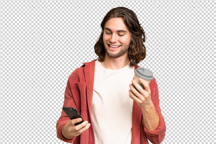 PSD young handsome man over isolated background holding coffee to take away and a mobile
