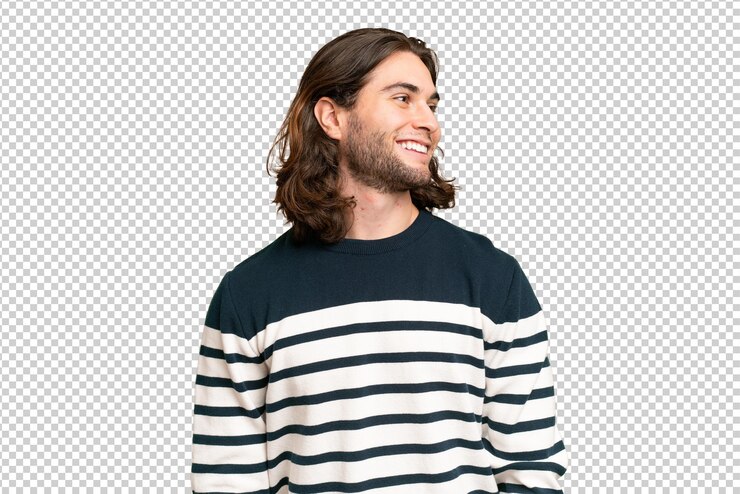 PSD young handsome man over isolated background looking side