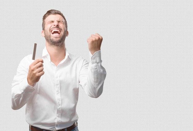 Young handsome man with credit card celebrating