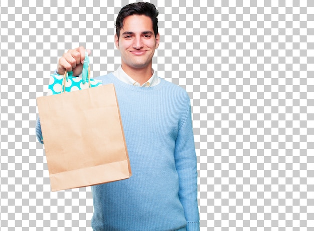 PSD young handsome tanned man with shopping bags