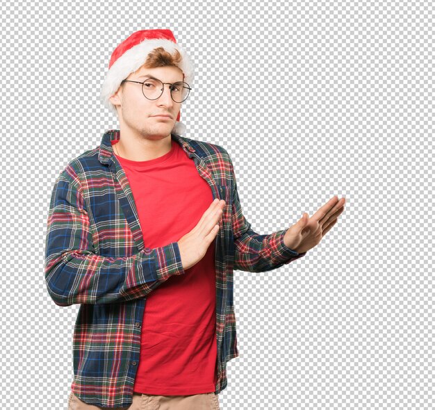 Young man at christmas doing gestures