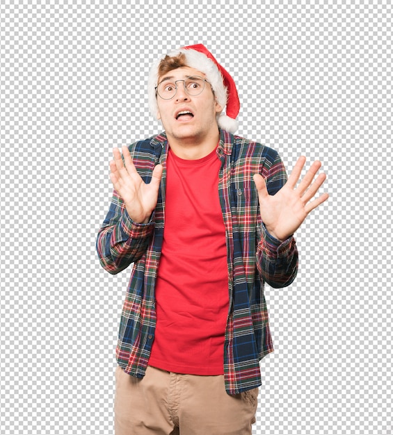 Young man at Christmas doing gestures