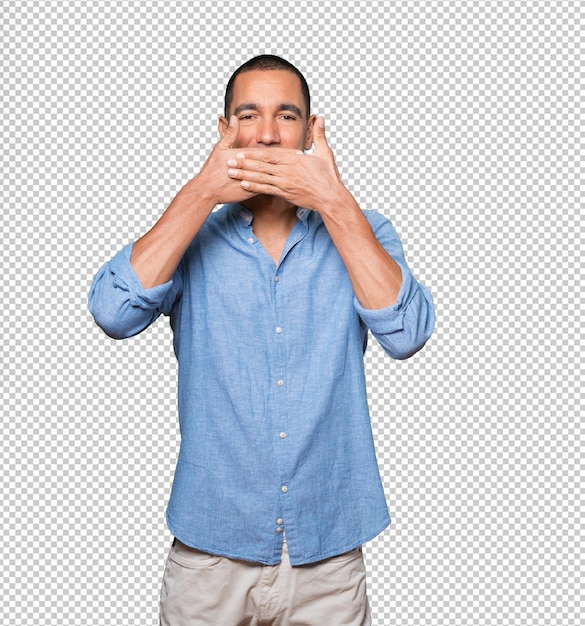 Young man covering his mouth with his hands