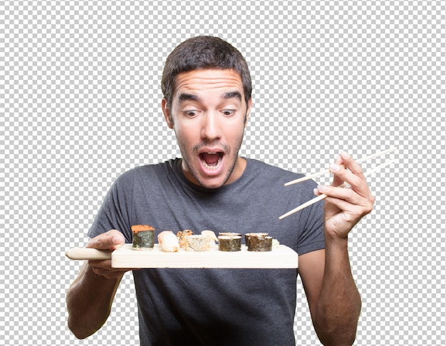 PSD young man eating sushi