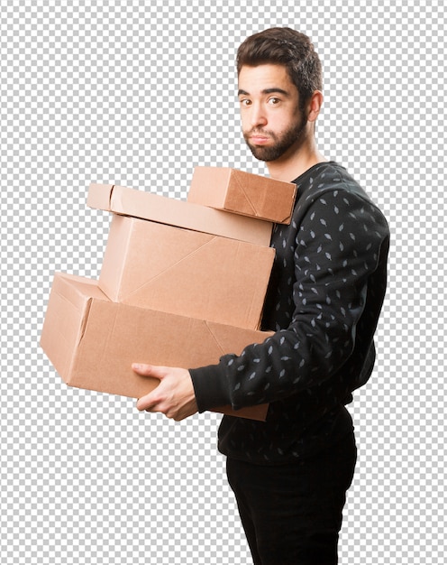 Young man holding boxes