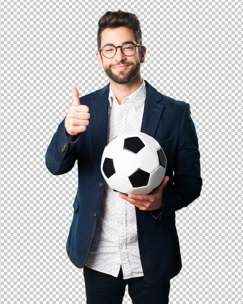 Young man holding a soccer ball