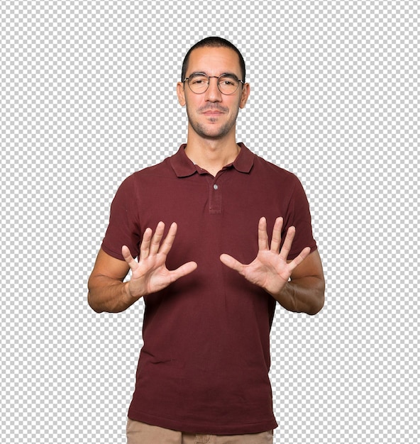 young man making a number ten gesture