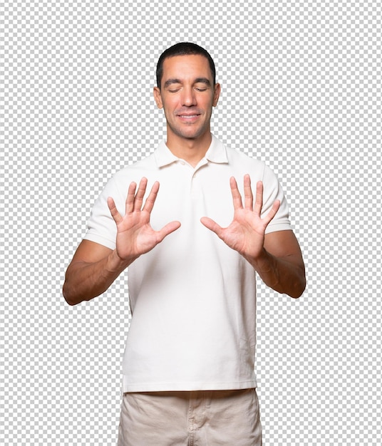 young man making a number ten gesture
