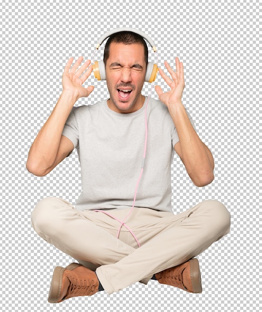 PSD young man in sitting position with a worry gesture