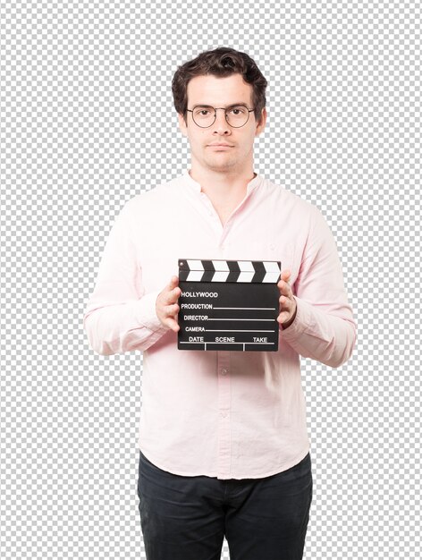 PSD young man using a clapperboard