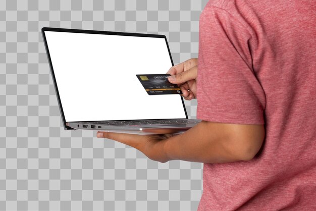 PSD young man using credit card with laptop