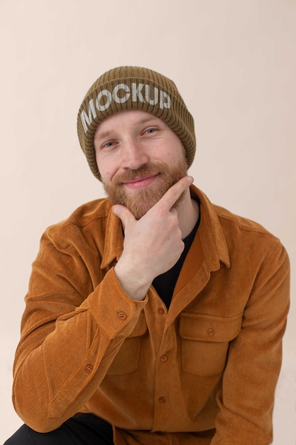 PSD young man wearing beanie mockup