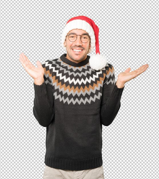 PSD young man wearing a christmas hat while gesturing isolated