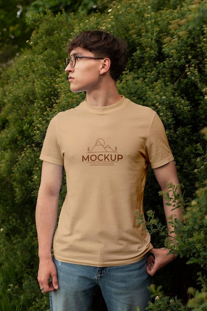 PSD young man wearing a mock-up t-shirt
