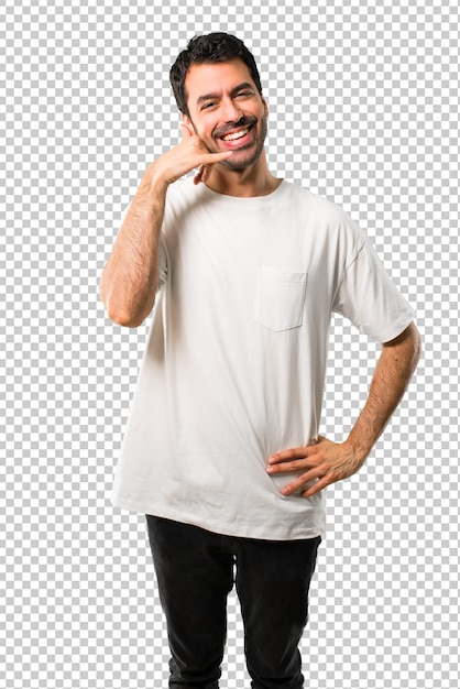 young man with white shirt making phone gesture and speaking with someone. call me back sign