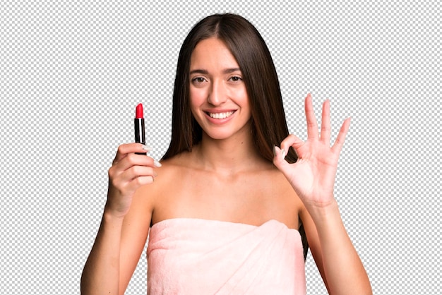 PSD young pretty woman holding a lipstick beauty concept