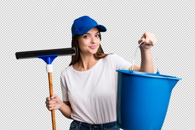 Young pretty woman housekeeper cleaning the windows