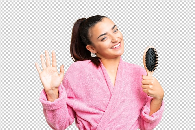 若い美しい女性が孤立したクロマキー背景を越えて