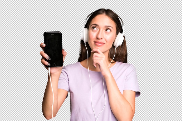 young pretty woman listening music with her headphones