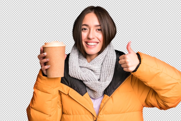 PSD young pretty woman wearing winter clothes and holding a take away coffee