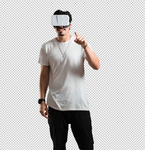 PSD young rapper man excited and entertained, playing with virtual reality glasses, exploring a fantasy world.