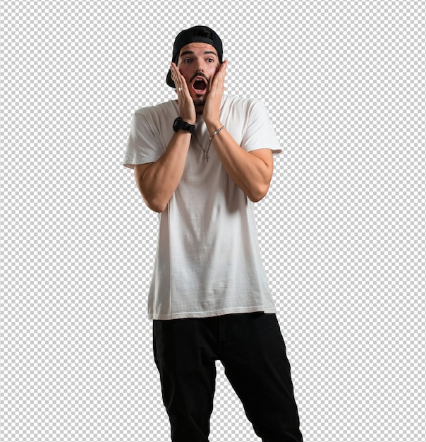 young rapper man surprised and shocked, looking with wide eyes