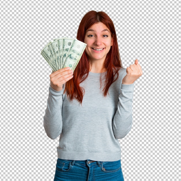 PSD young redhead girl happy because has won a lot of money
