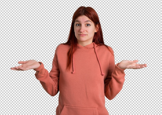 PSD young redhead girl with pink sweatshirt having doubts and with confuse face expression