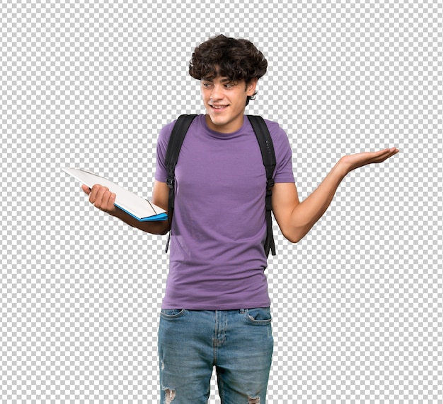 PSD young student man holding copyspace with two hands