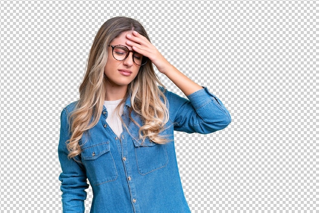 Young Uruguayan woman over isolated background with headache