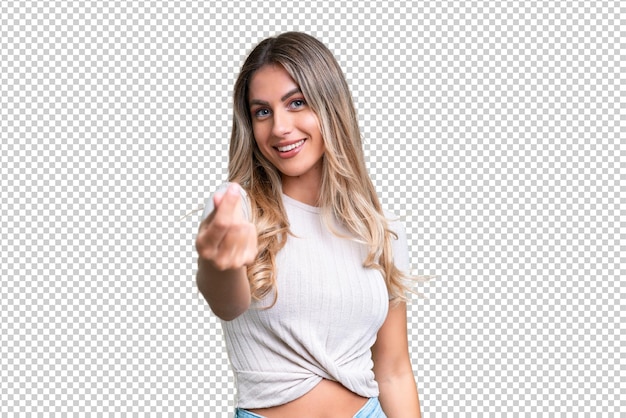 Young Uruguayan woman over isolated background making money gesture