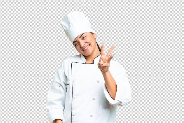 Young woman Chef over isolated chroma key background happy and counting three with fingers