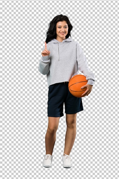 Young woman playing basketball pointing up a great idea