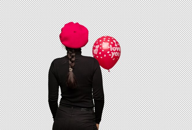 PSD young woman in valentines day from behind, looking back