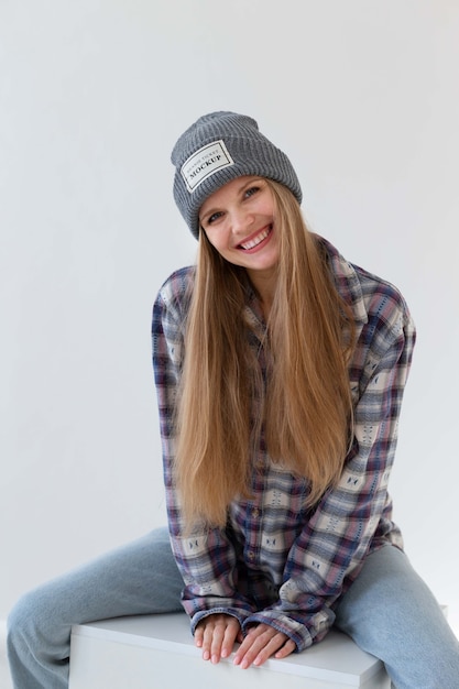 PSD young woman wearing beanie mockup