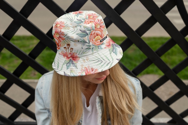 PSD young woman wearing bucket hat mockup