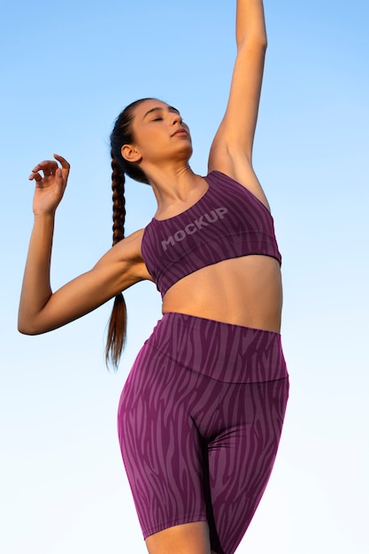Young woman wearing sports clothing mockup