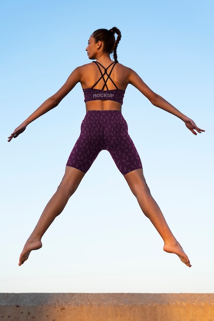 Young woman wearing sports clothing mockup