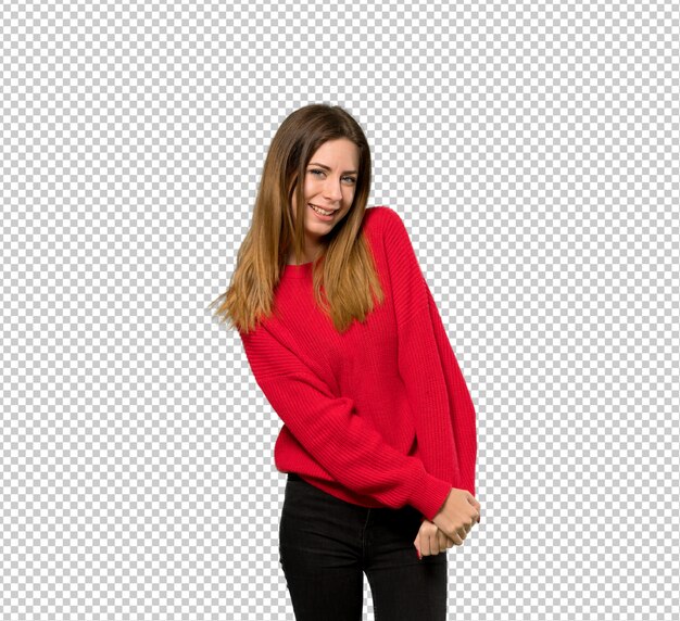 Young woman with red sweater smiling