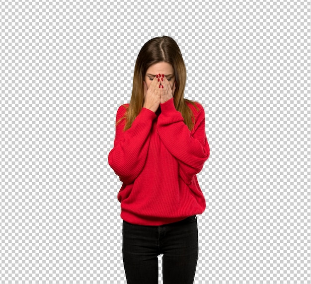 Young woman with red sweater with tired and sick expression