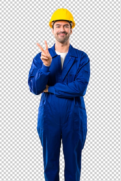 Young workman with helmet happy and counting two with fingers
