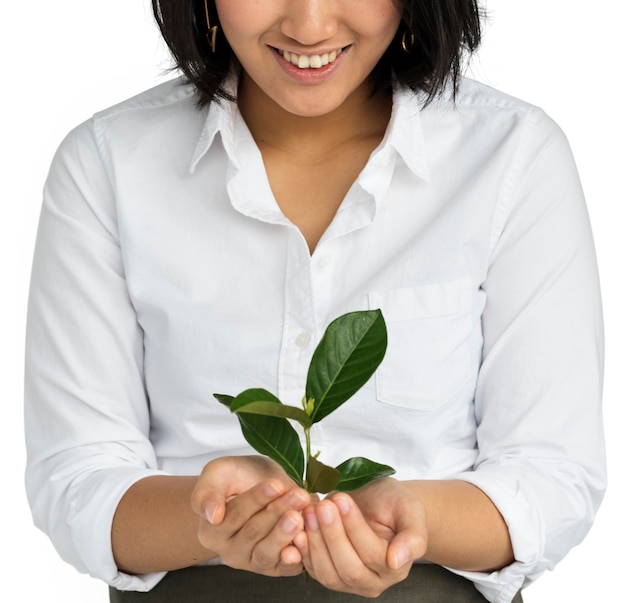 Zakelijke kleding vrouwelijke holding seedling